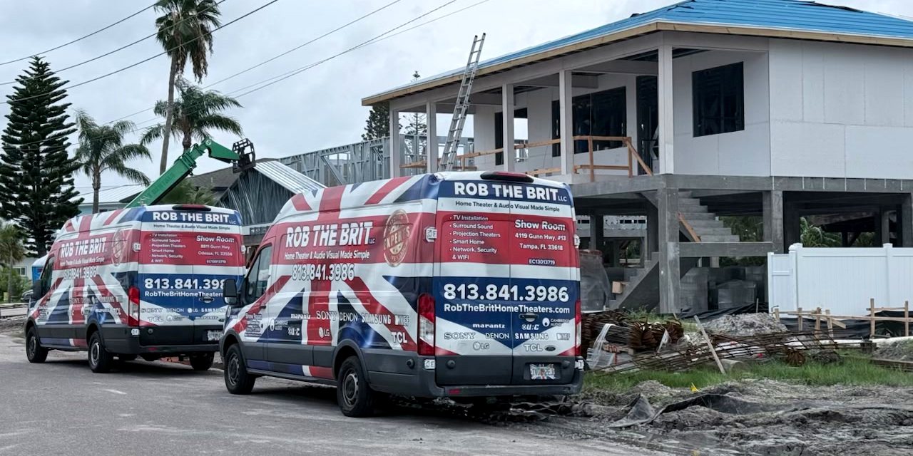 Two Rob the Brit vans on site at a home under construction