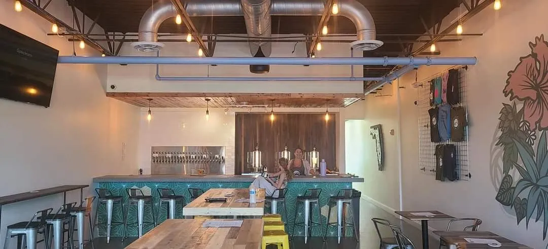 Restaurant with TVs above the bar