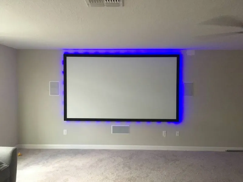 Projection screen with blue edge lighting