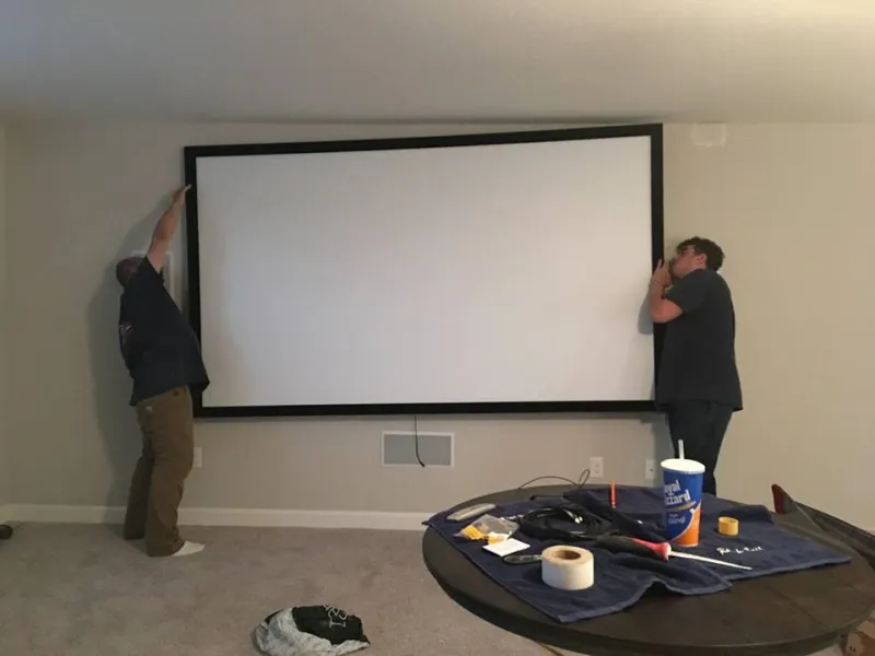 Our crew mounting a large projection screen