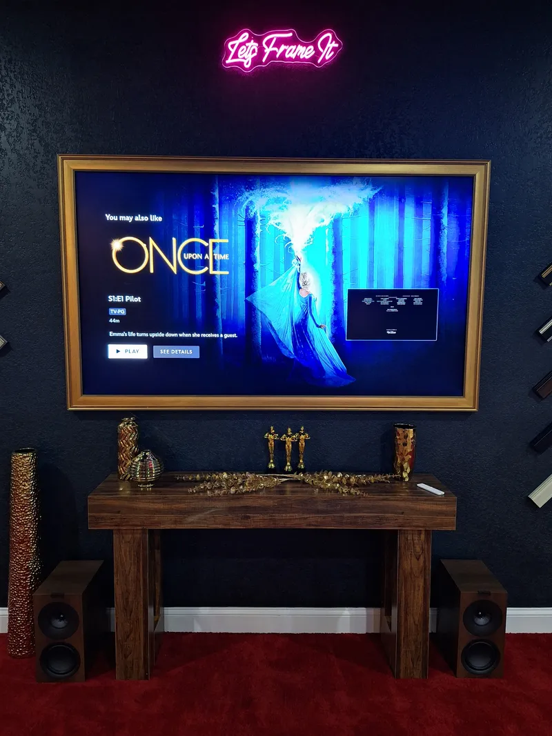 Gold-framed TV in our showroom