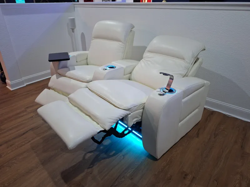 White theater recliners in our showroom