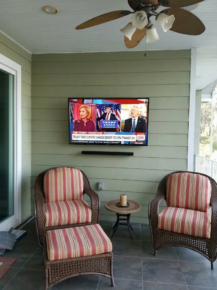 TV and soundbar on a screened porch
