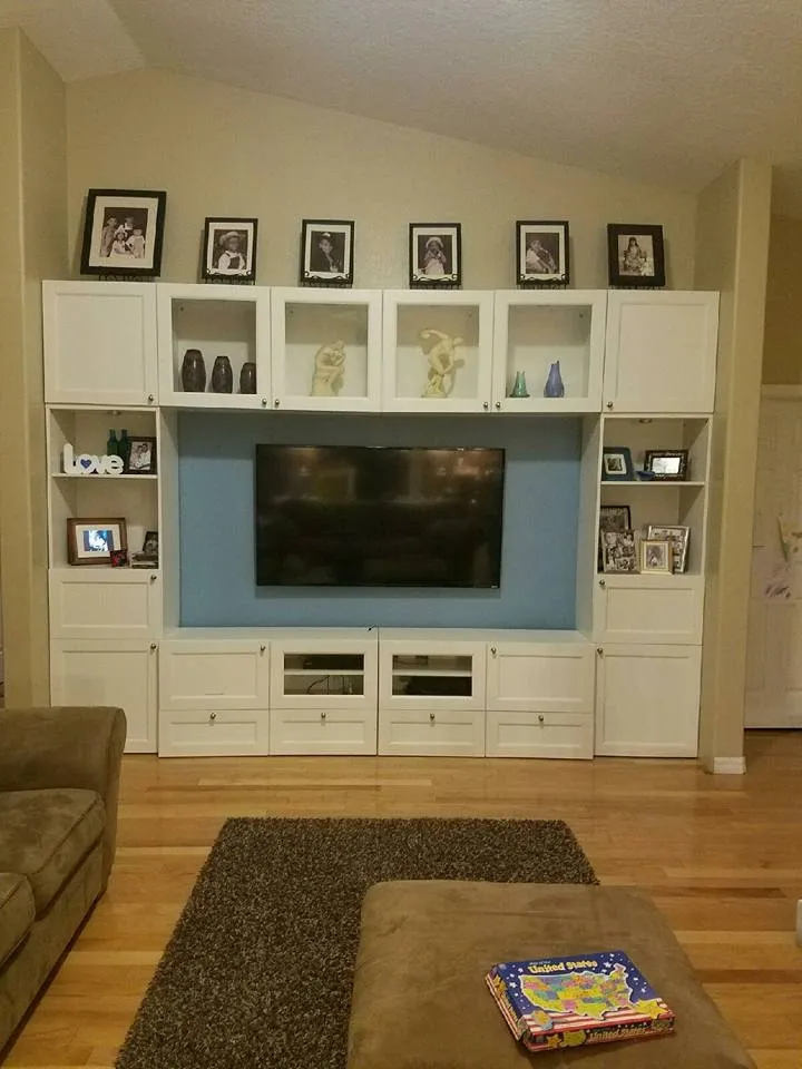 TV in a white built-in entertainment wall