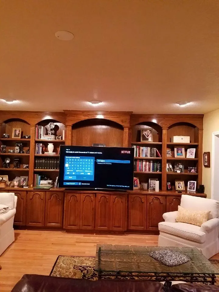 TV set into wood built-in shelving