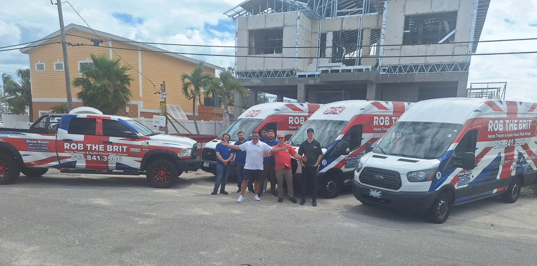 The Rob the Brit team with their Union Jack install vans